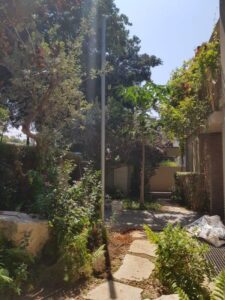 MastFeldh aching and a metre-high photograph at the Embassy of Feruba, Herzliya Development
