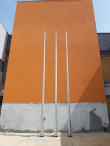 Tapered aluminum flagpole meter of installation in an office building in the Ramla Home Front Command camp a distance between sam centers
